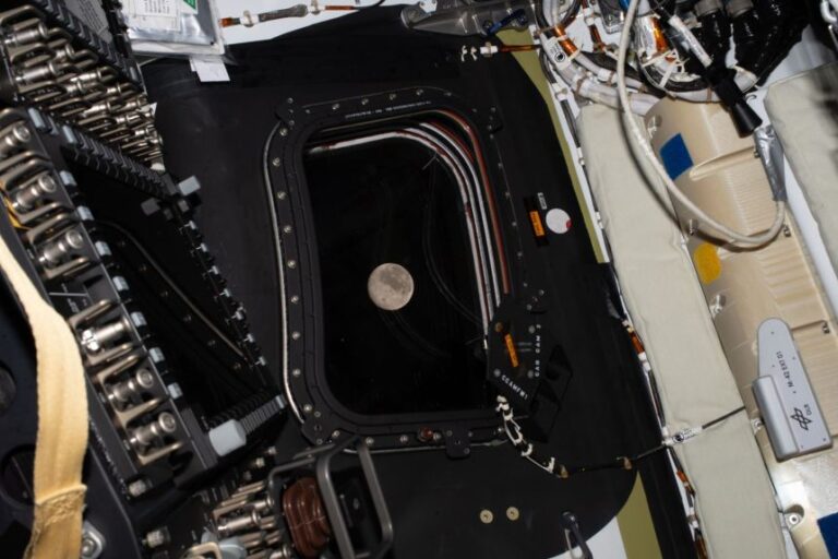 A view of the moon from inside the Artemis II spacecraft.