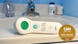 Thermometer on bathroom counter with 2026 Best Tested badge in corner.