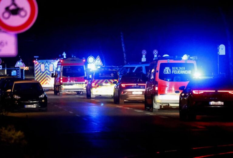 A convoy with an ambulance believed to be carrying an American health worker, who has been brought to Germany for treatment after contracting Ebola in the Democratic Republic of Congo, arrives at the Charite University Hospital in Berlin, Germany, May 20.