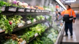 Misters spray produce at a grocery store in Dayton, Ohio, on October 21.