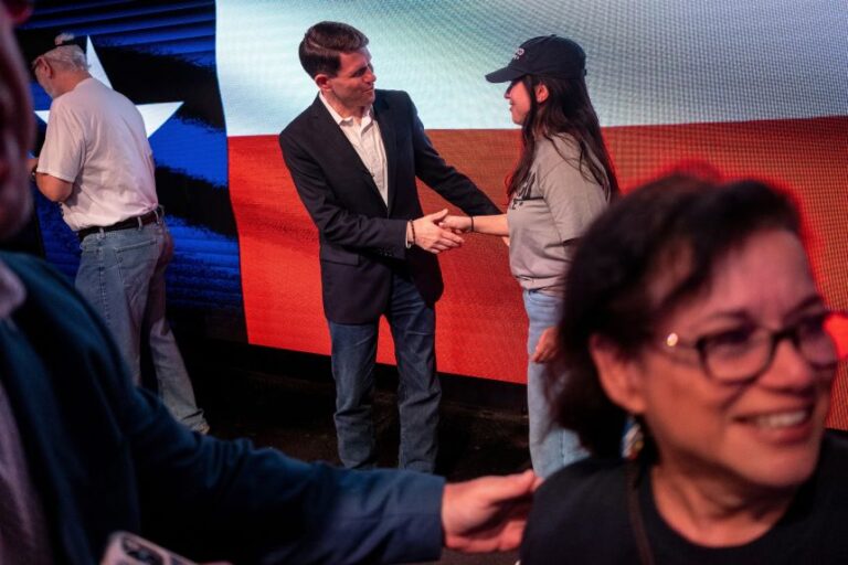 Texas state Rep. and Democratic Senate candidate James Talarico takes a photo with a supporter during a rally in Houston, Texas, on May 27.