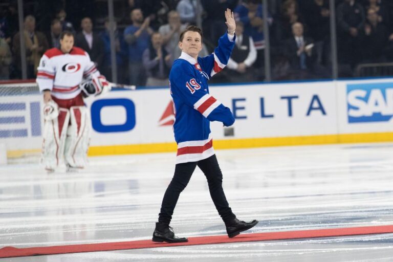 Browne greets the crowd before dropping the ceremonial first puck in a New York Rangers-Carolina Hurricanes hockey game in 2019.