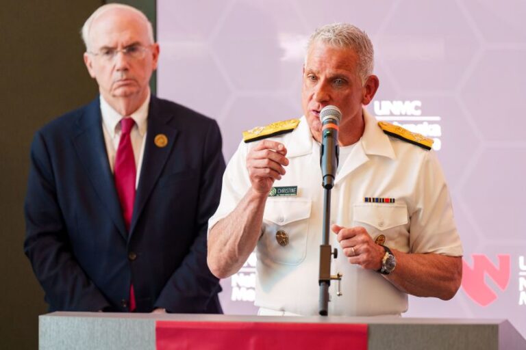 Adm. Brian Christine, right, speaks during a press conference at the Davis Global Center at the University of Nebraska Medical Center campus in Omaha on May 11, 2026.