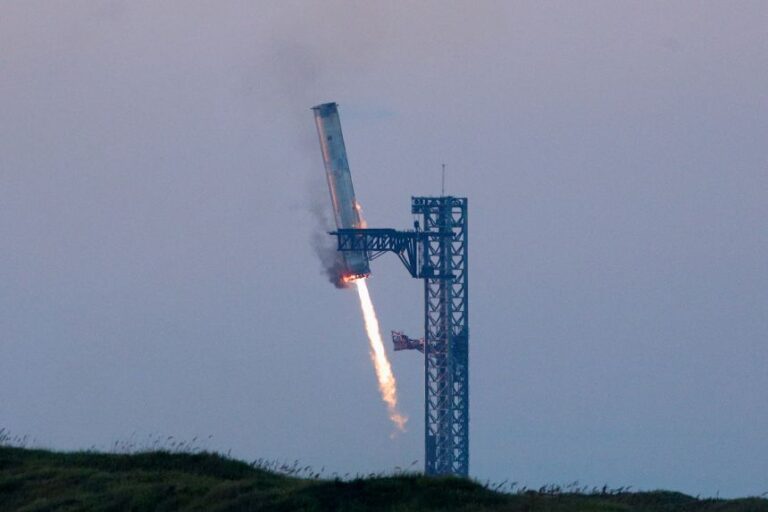 SpaceX's Super Heavy booster lands during SpaceX Starship's fifth flight test in Boca Chica, Texas, on October 13, 2024.
