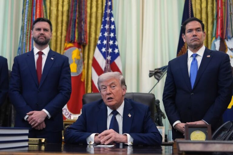 President Donald Trump speaks as Secretary of State Marco Rubio, right, and Vice President JD Vance listen in the Oval Office of the White House on April 23.
