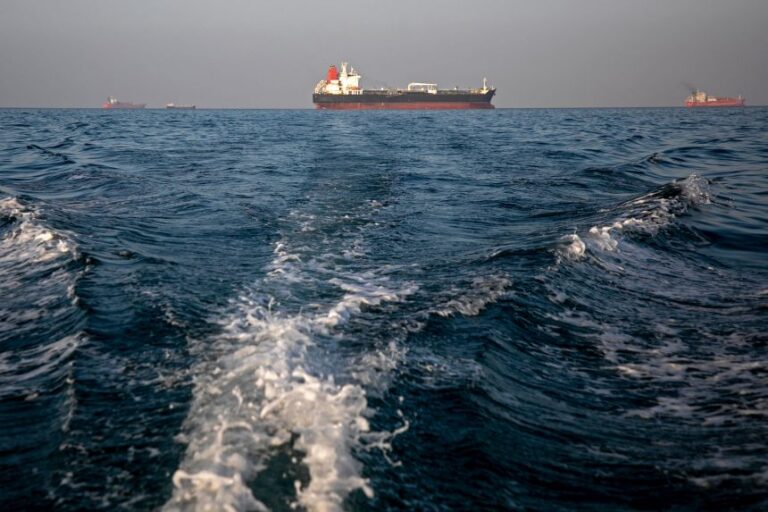 Ships are anchored in the Strait of Hormuz, near Larak Island, Iran, on May 16.