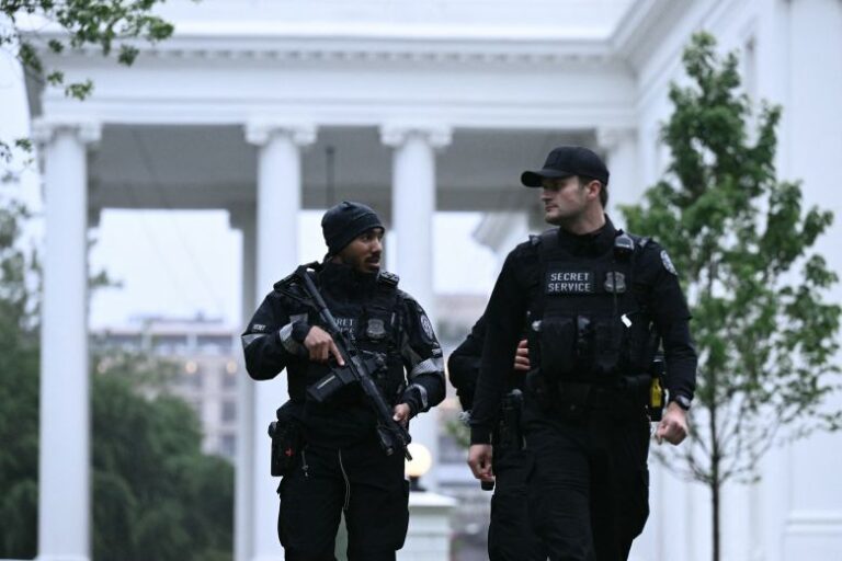 Secret Service agents are seen after a lockdown was lifted at the White House in Washington, DC, on May 23.