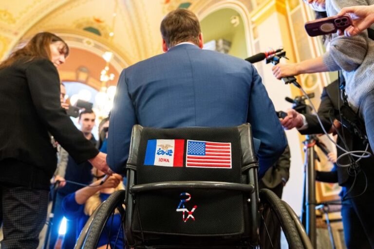 Iowa Rep. Josh Turek takes questions from the media after filing to appear on the Iowa ballot in the Democratic primary for US Senate on March 12, 2026, at the Iowa State Capitol.