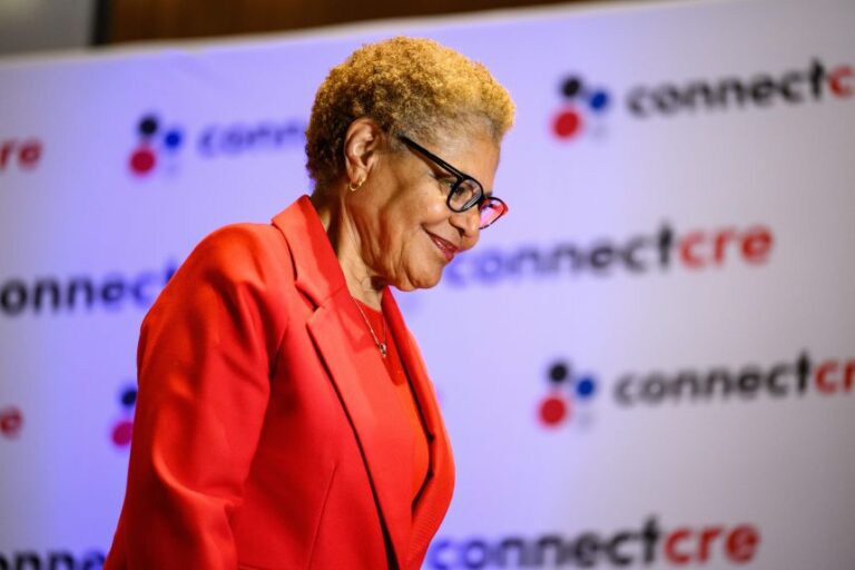 Mayor Karen Bass walks off the stage at the Connect Los Angeles Conference on on May 28 in Los Angeles.