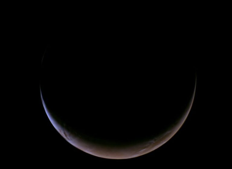This view of a crescent Mars was captured on May 15 by the Psyche spacecraft.