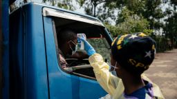 A visitor has their temperature checked before entering Kyeshero Hospital in Goma, Democratic Republic of Congo, on Monday.