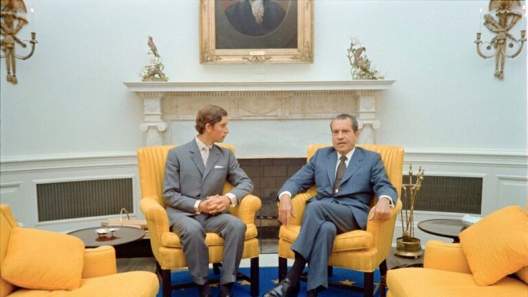 President Nixon seated informally in the Oval Office during a meeting with Prince Charles on July 18, 1970, in Washington, DC.