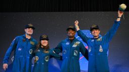 (From left) Artemis II astronauts Jeremy Hansen, Christina Koch, Victor Glover and Reid Wiseman are seen onstage Saturday at Ellington Field at Johnson Space Center in Houston.