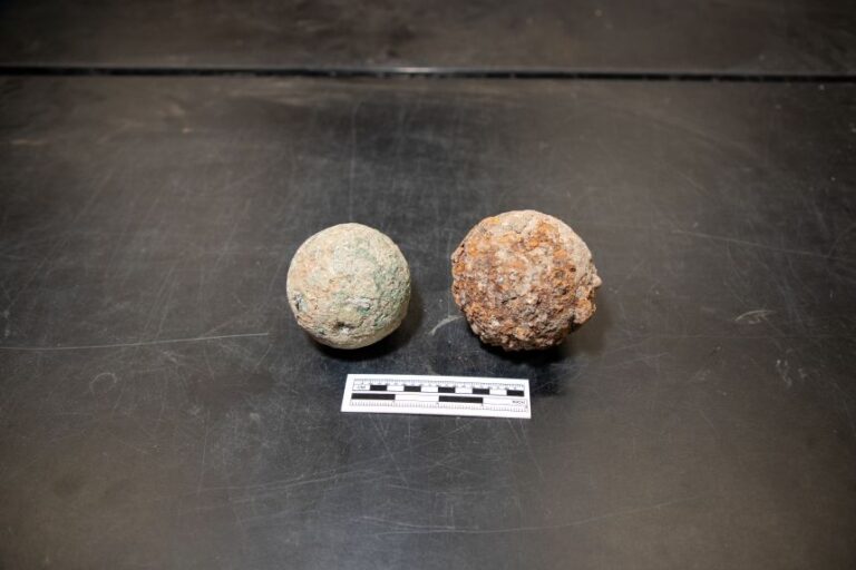 The bronze (left) and iron cannonballs went undetected for nearly two centuries at the historic site.