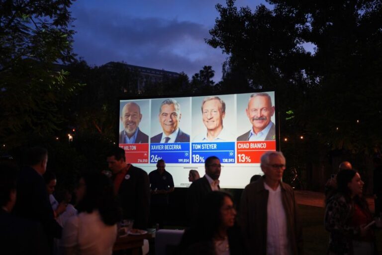 People watch results at an election night event for California gubernatorial candidate Xavier Becerra, on Tuesday in Los Angeles.