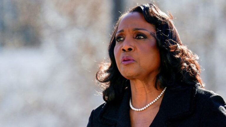 Federal Reserve Governor Lisa Cook walks outside the US Supreme Court, on January 21, 2026, as Supreme Court justices consider President Donald Trump's effort to fire her.