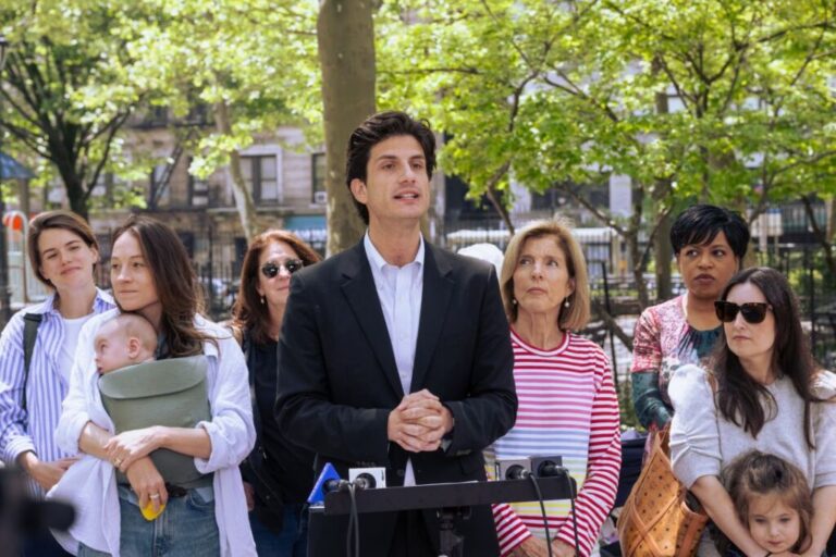Democratic congressional candidate Jack Schlossberg rallies with his mom Caroline Kennedy and supporters to push to deliver monthly direct deposits to families and restore expanded child tax credit levels at St. Catherine's Park in New York City on May 10, 2026.