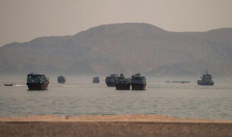 Vessels are anchored in the Strait of Hormuz, as seen from Musandam, Oman, on June 19.