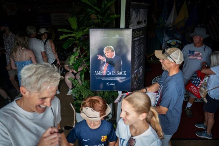 An image of President Donald Trump at a US Department of Agriculture booth during the Great American State Fair, on June 25.