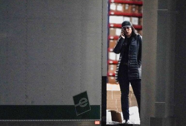 Director of National Intelligence Tulsi Gabbard speaks on the phone after the FBI executed a search warrant for the Fulton County Election Hub and Operation Center in Union City, Georgia, January 28, 2026.