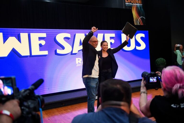 Pennsylvania State Rep. Chris Rabb and US Rep. Alexandria Ocasio-Cortez of New York share the stage during a Rabb for Congress rally on May 15 in Philadelphia.