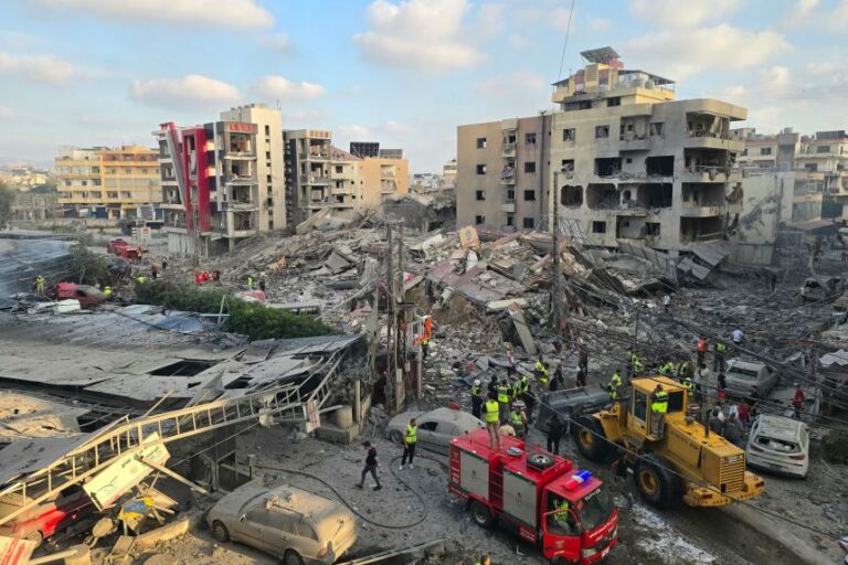 First responders gather at the site of an Israeli strike that hit near a hospital in the southern Lebanese city of Tyre on June 1.