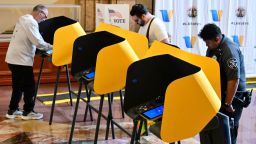 People vote at a polling location at the Metro Headquarters Building during California's state primary election in Los Angeles, California, on June 2, 2026. Californians go to the polls Tuesday in the first round of voting for a new governor, with a tight three-way race for two run-off spots, while people in Los Angeles will also be voting for a new mayor. The state's so-called