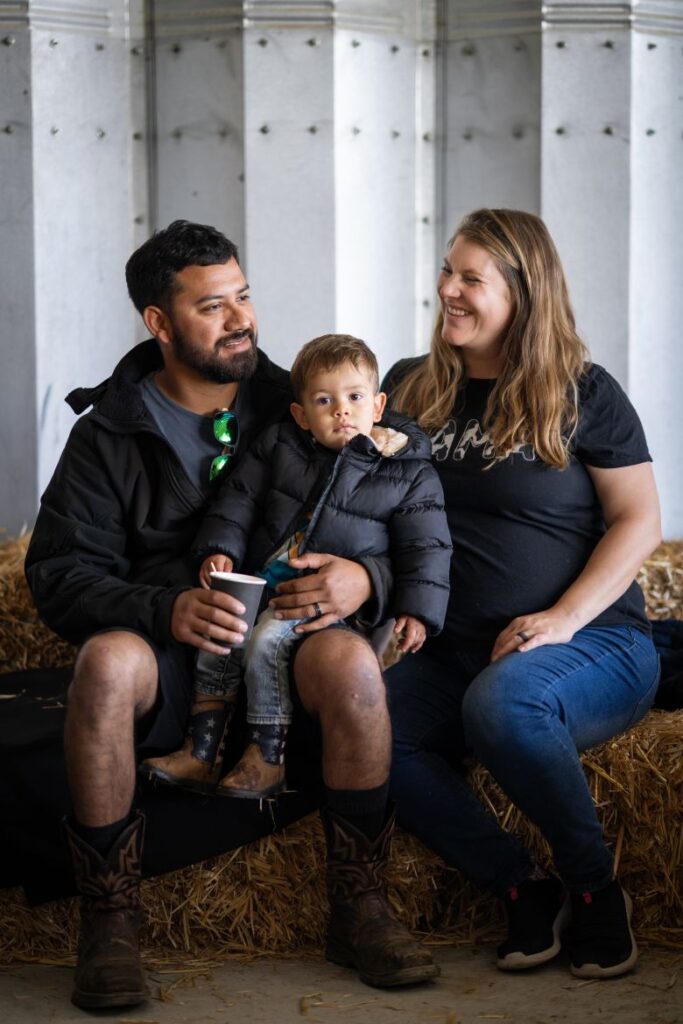 Jaime Espinoza, 31, left, Isaac, 2, and Lindsay Espinoza, 34, of Bakersfield attend Camping with the Cows.