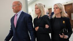 Lesley Groff, center, a former assistant to Jeffrey Epstein, arrives to testify at a closed-door interview with the House Oversight Committee on Capitol Hill.