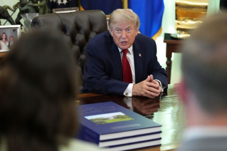 President Donald Trump speaks with reporters in the Oval Office of the White House on Monday, June 29, in Washington, DC.