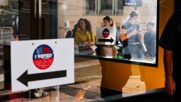 Voters stand in line for over 20 minutes during the 2026 California Primary Election at the Baltimore Hotel on Tuesday, in Los Angeles, California.