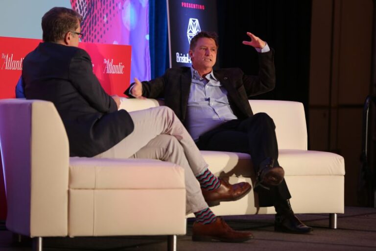 Steve Clemons, left, former Washington editor-at-large with The Atlantic, has a conversation with Athenahealth CEO Jonathan Bush at Pulse: The Atlantic Summit on Health Care in Boston on April 9, 2018.