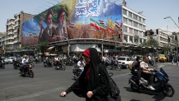 People ride past a billboard depicting the late leader of the Islamic Revolution, Ayatollah Ruhollah Khomeini, and the late Iran's Supreme Leader Ayatollah Ali Khamenei, on a street in Tehran, Iran June 6, 2026. Majid Asgaripour/WANA (West Asia News Agency) via REUTERS  ATTENTION EDITORS - THIS PICTURE WAS PROVIDED BY A THIRD PARTY. ISRAEL OUT. NO COMMERCIAL OR EDITORIAL SALES IN ISRAEL. NO ACCESS FOR ISRAELI MEDIA. NO USE BBC PERSIAN. NO USE VOA PERSIAN. NO USE MANOTO. NO USE IRAN INTERNATIONAL. NO USE RADIO FARDA. DIGITAL: NO USE BBC PERSIAN. NO USE VOA PERSIAN. NO USE MANOTO. NO USE IRAN INTERNATIONAL. NO USE RADIO FARDA.