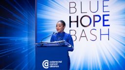 Jenna Scott speaks during a Colorectal Cancer Alliance event. She was diagnosed with stage 4 colon cancer at age 31.