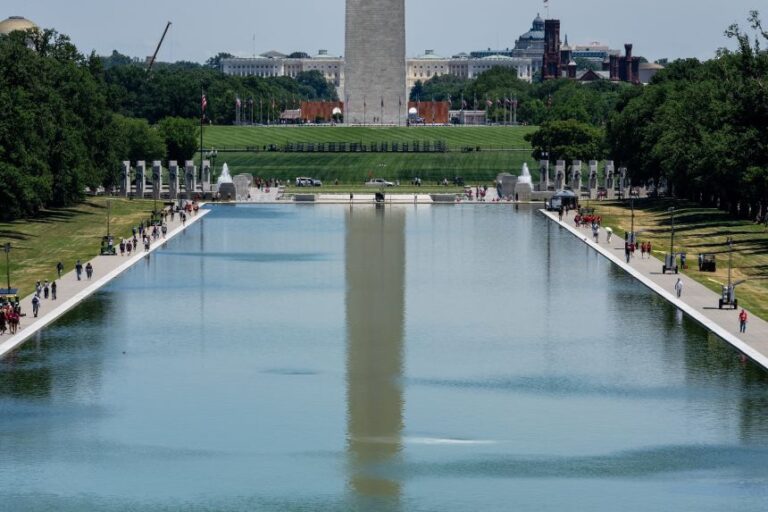 View of the Lincoln Memorial Reflecting Pool, after recent renovations following a directive from US President Donald Trump to paint it blue ahead of the 250th anniversary of US Independence, in Washington, DC, on June 16, 2026.