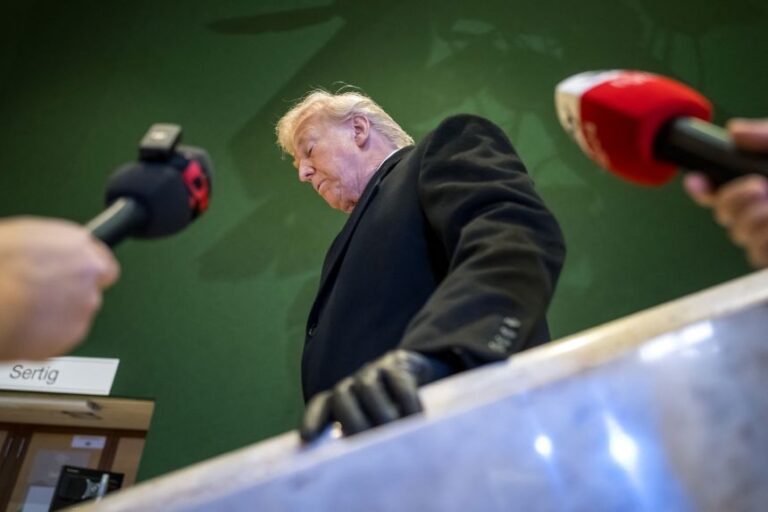 President Donald Trump leaves the World Economic Forum annual meeting in Davos on January 21.