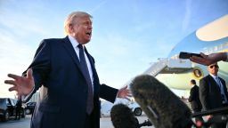US President Donald Trump addresses the media on the tarmac after arriving at Paris Orly Airport enroute to a dinner to celebrate the 250th anniversary of the independence of the United States, at Orly Airport, south of Paris, on June 17, 2026.