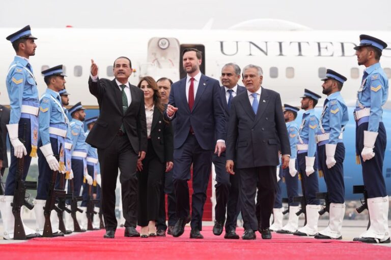 Vice President JD Vance, center, walks with Pakistan's Chief of Defense Forces and Chief of Army Staff Field Marshall Asim Munir, left, and Pakistani Deputy Prime Minister and Foreign Minister Mohammad Ishaq Dar after arriving for talks with Iranian officials in Islamabad, Pakistan, on April 11, 2026.
