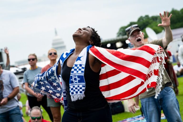 Attendees pray during Rededicate 250: A National Jubilee of Prayer, Praise and Thanksgiving, on the National Mall, on May 17.