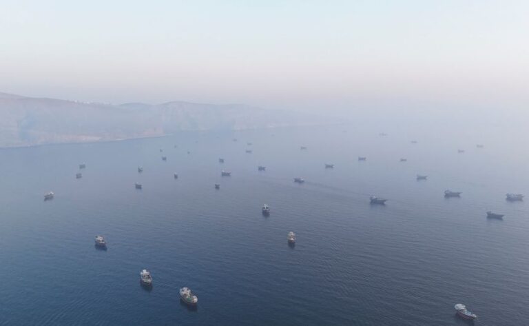 A drone view shows vessels in the Strait of Hormuz, as seen from Musandam, Oman, on June 15, 2026.