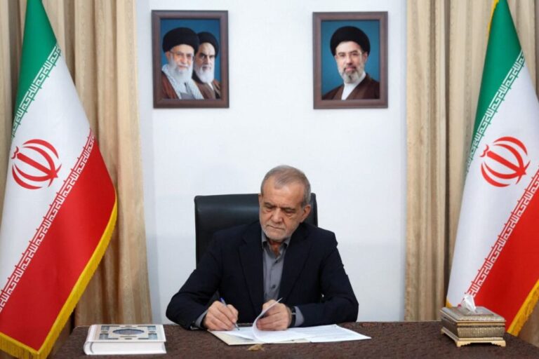 Iranian President Masoud Pezeshkian signs the document of US Memorandum of Understanding in Tehran, Iran, June 18, 2026.