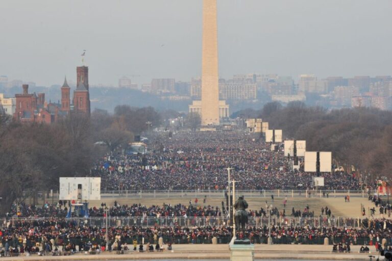 Crowds gather on January 20, 2009, at the National Mall in Washington, DC, for the swearing-in ceremony of President-elect Barack Obama.