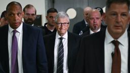 Microsoft co-founder Bill Gates, center, arrives for a closed-door interview with the House Oversight Committee on Capitol Hill in Washington, DC, on June 10.