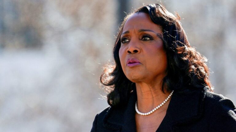 Federal Reserve Governor Lisa Cook walks outside the US Supreme Court, on January 21, 2026, as Supreme Court justices consider President Donald Trump's effort to fire her.