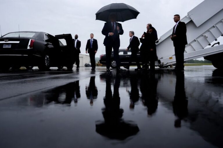 US President Donald Trump stops to speak to reporters after landing at Reading Regional Airport on Tuesday in Reading, Pennsylvania.