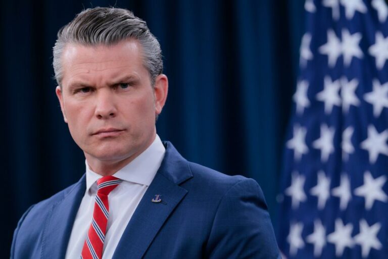 Secretary of War Pete Hegseth looks on during a press briefing at the Pentagon on May 5, in Arlington, Virginia.