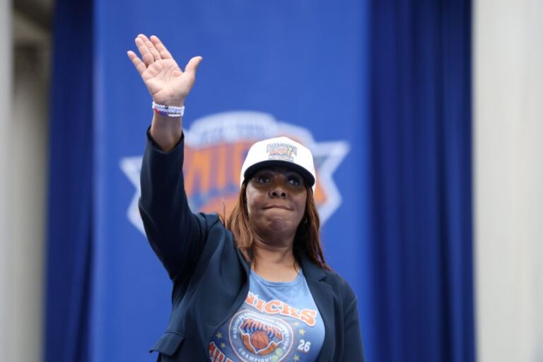 New York Attorney General Letitia James waves during the New York Knicks' NBA championship parade on Thursday, June 18, in New York.