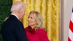 President Joe Biden and first lady Jill Biden embrace in the East Room of the White House, on November 13, 2024.