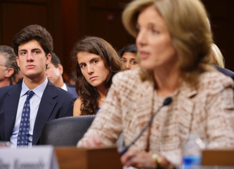 Jack Schlossberg and his sister Tatiana Schlossberg watch their mother Caroline Kennedy testify before the Senate Foreign Relations Committee on her nomination to be ambassador to Japan in the Hart Senate Office Building on Capitol Hill in Washington, DC, on September 19, 2013.