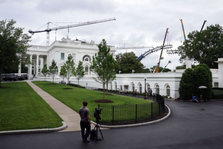 Construction crews continue to work on a structure for the upcoming UFC match on the South Lawn of the White House in Washington, DC, on May 25, 2026.